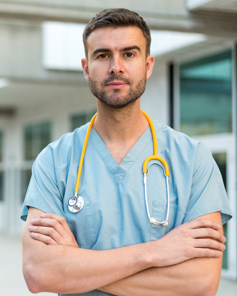 male-nurse-with-stethoscope-GZDHN3C